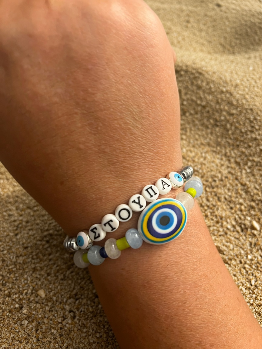 Colorful handmade bracelets worn on a wrist