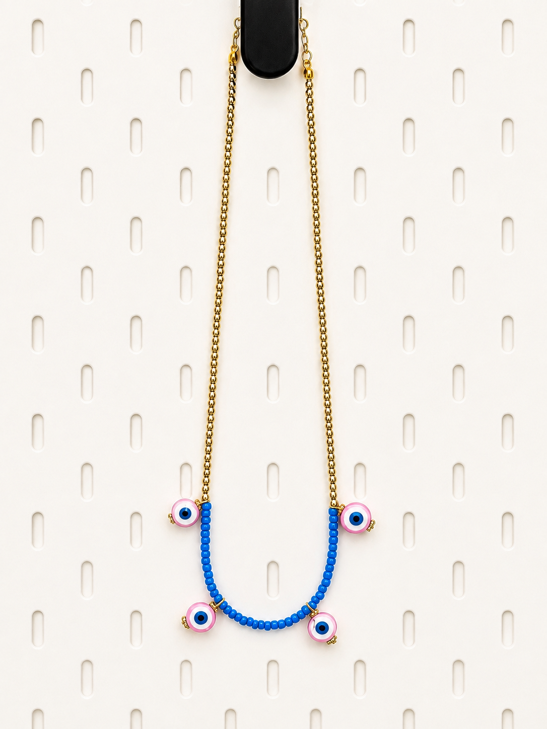 Custom handmade bracelets with blue beads and letter details