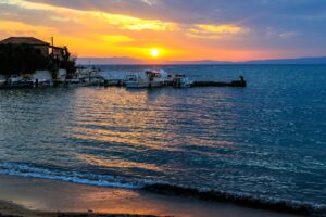 Sunset over the water in Mani, Greece
